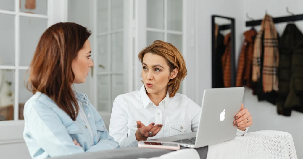 Two parents discussing homeschooling expectations and advice