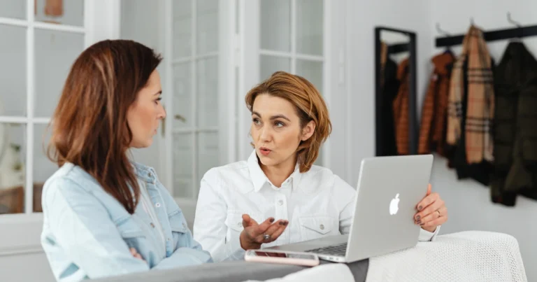 Two parents discussing homeschooling expectations and advice