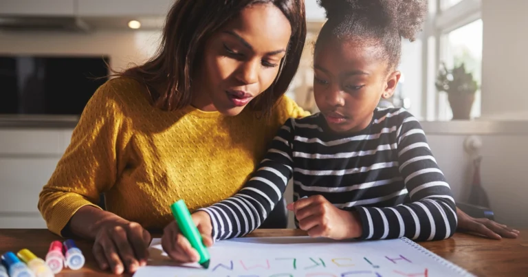 Parent and child working together one-on-one during homeschool hours at home