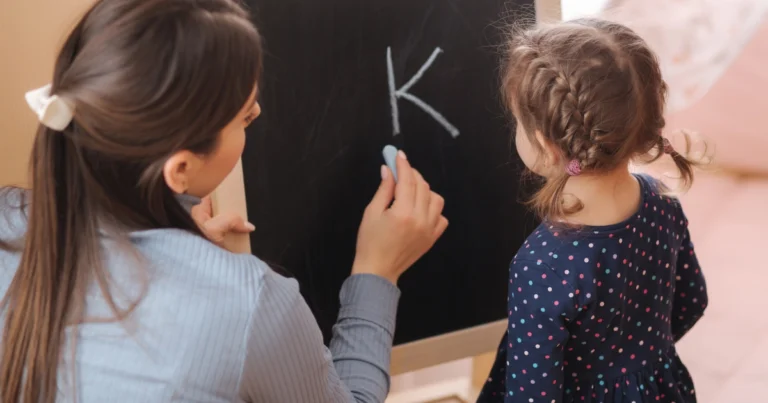 Parent helping a young child learn at home, representing thoughtful homeschooling and educational involvement.